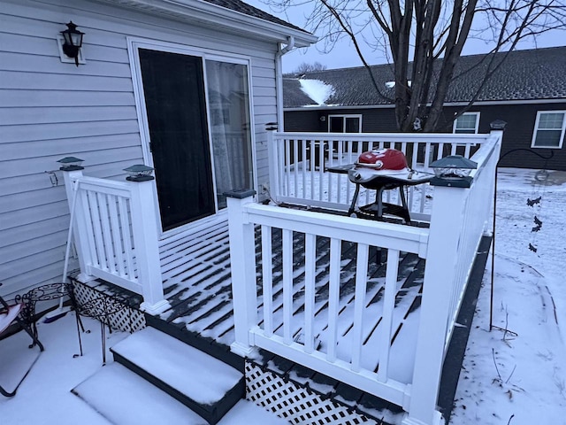 view of snow covered deck