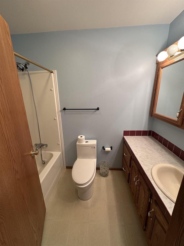 full bathroom with vanity, toilet, and shower / washtub combination