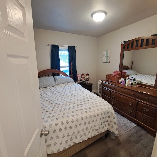 bedroom featuring hardwood / wood-style floors