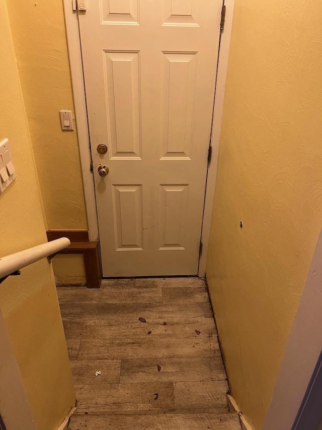 doorway featuring hardwood / wood-style flooring