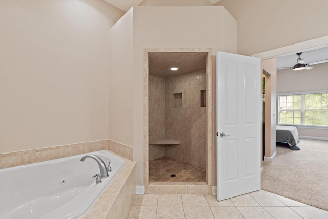 bathroom featuring lofted ceiling, tile patterned floors, and plus walk in shower