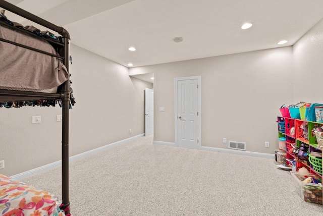 rec room featuring carpet