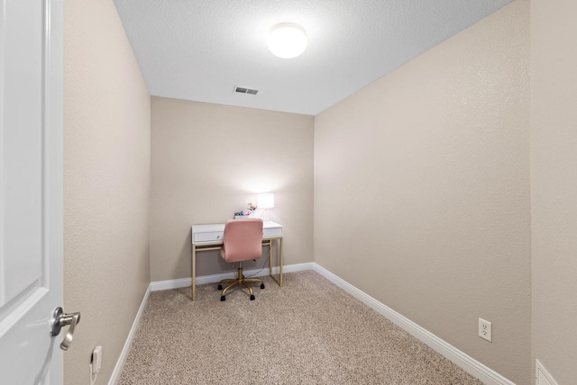 office space featuring light carpet