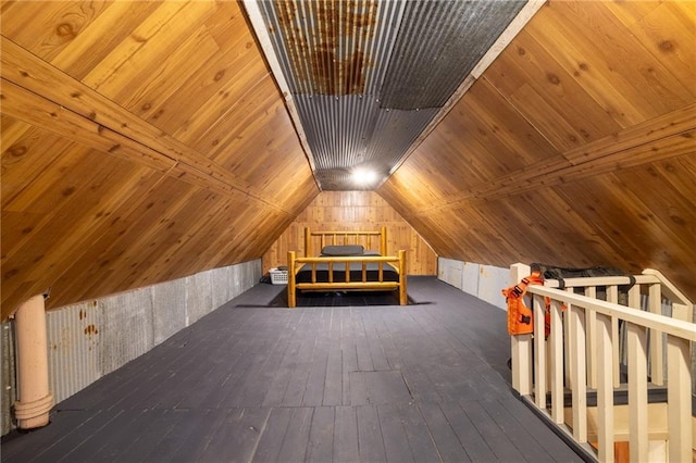 bonus room featuring lofted ceiling, wood ceiling, and dark hardwood / wood-style flooring