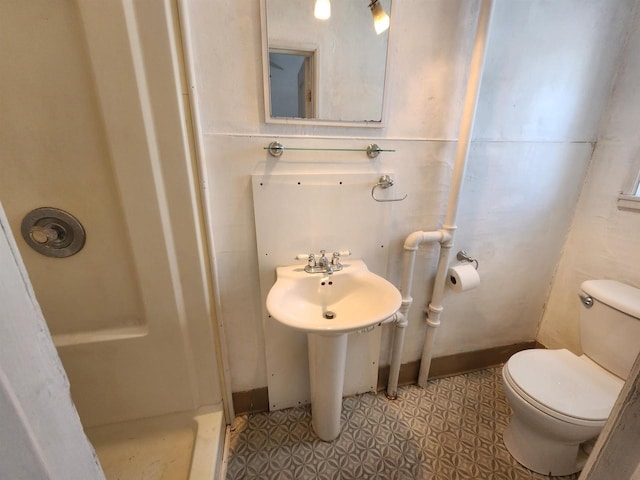 bathroom featuring toilet