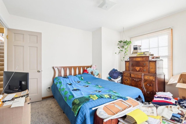 bedroom with light colored carpet