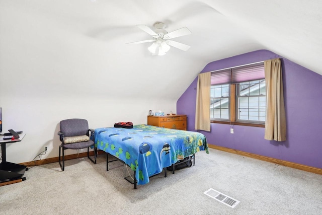 bedroom featuring ceiling fan, lofted ceiling, and carpet