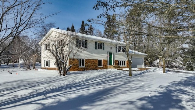 split foyer home featuring a garage