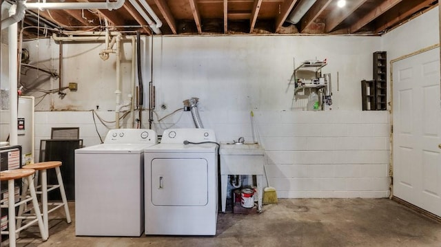 laundry room featuring washing machine and dryer