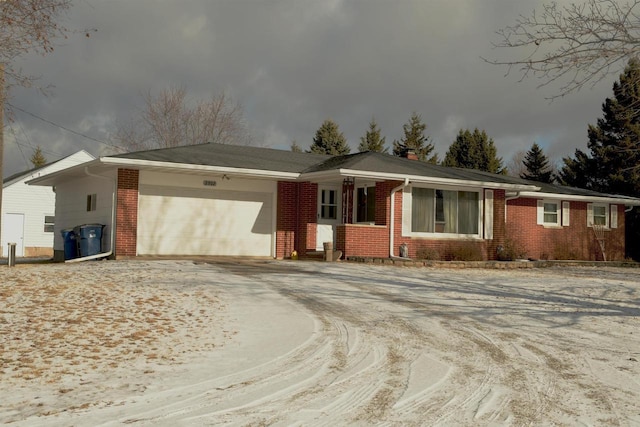 ranch-style home with a garage