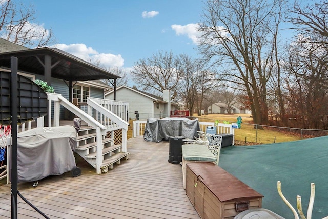 wooden deck featuring grilling area