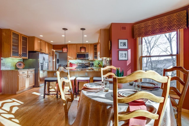 dining room featuring light wood-type flooring