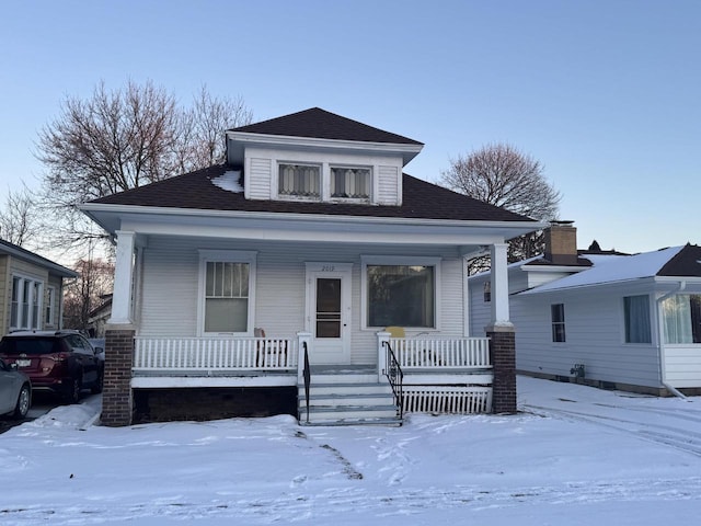 bungalow featuring a porch