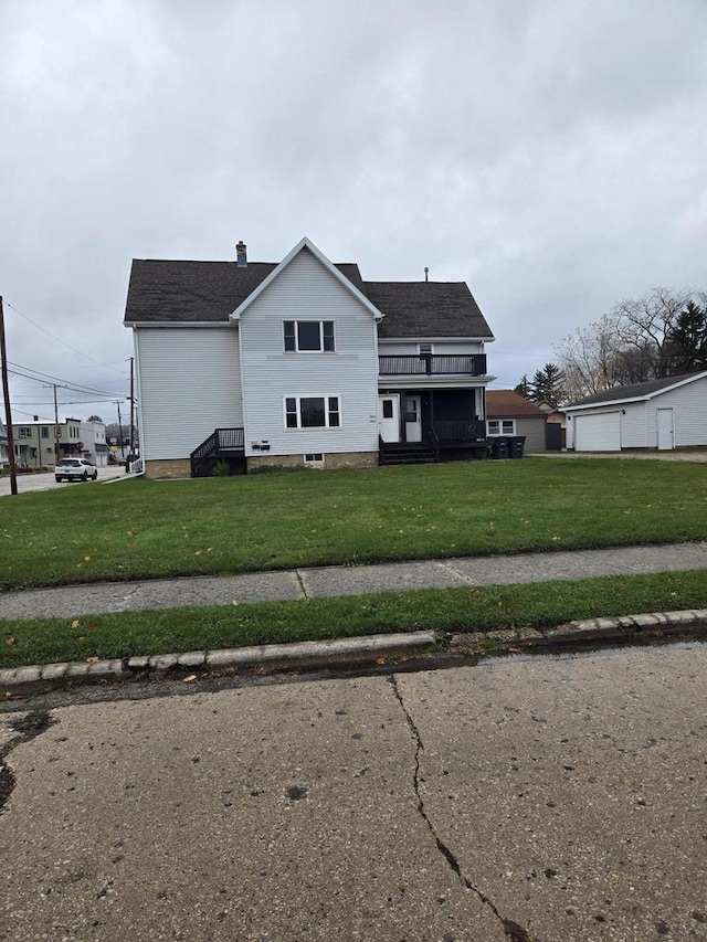 view of side of property featuring a yard