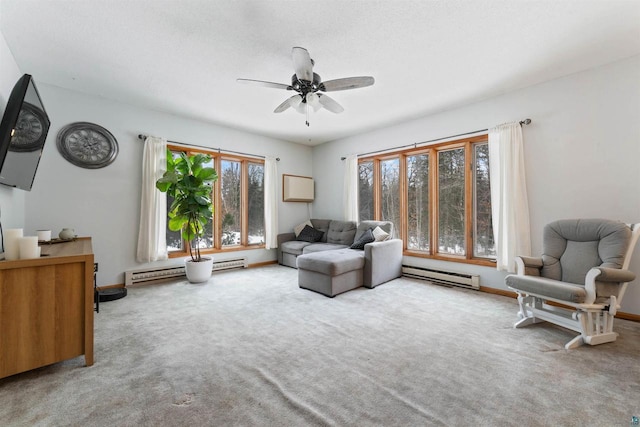 living room with carpet flooring, ceiling fan, and baseboard heating