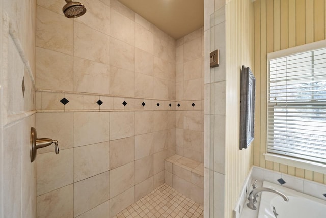 bathroom with plenty of natural light and independent shower and bath