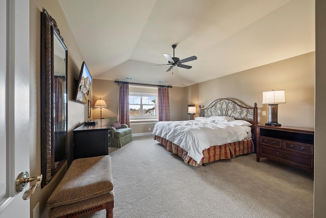 carpeted bedroom with lofted ceiling and ceiling fan