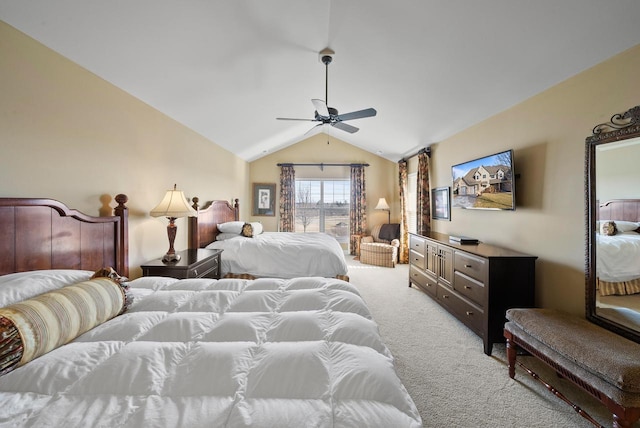 carpeted bedroom with lofted ceiling and ceiling fan