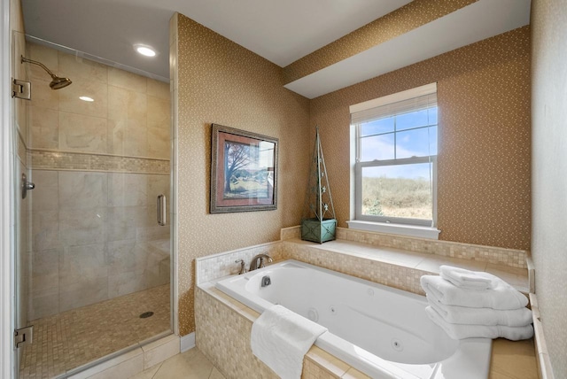 bathroom with tile patterned flooring and independent shower and bath