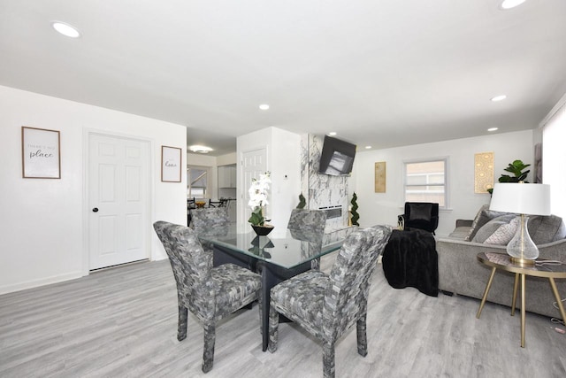 dining room with light wood-type flooring