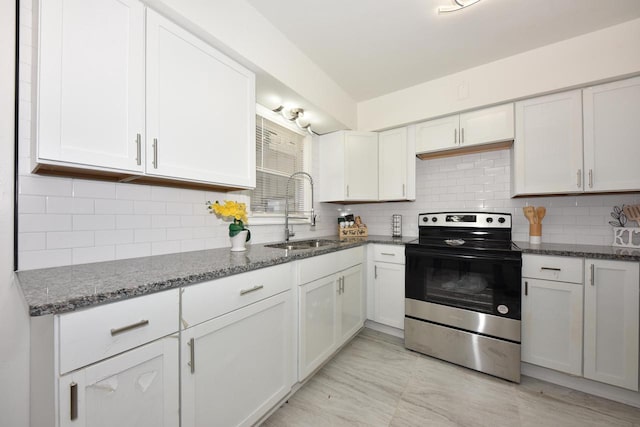 kitchen with white cabinetry, sink, tasteful backsplash, and stainless steel electric range oven