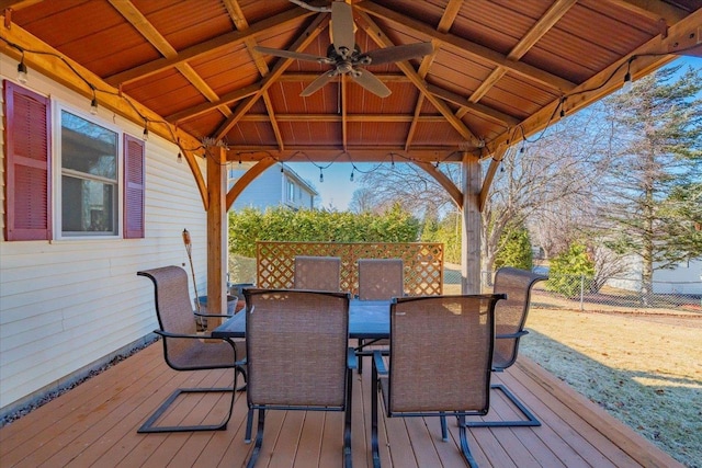 deck with a gazebo and ceiling fan