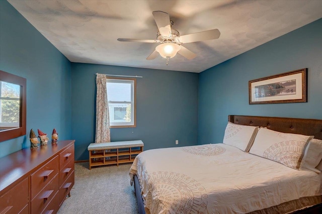 bedroom with light colored carpet and ceiling fan