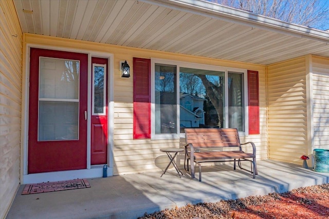 entrance to property featuring covered porch