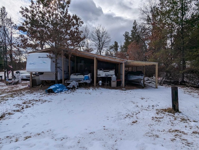 exterior space with a carport