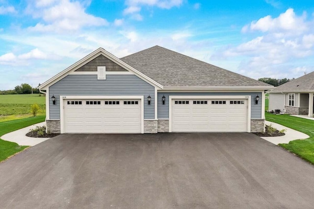 craftsman-style home featuring a front lawn