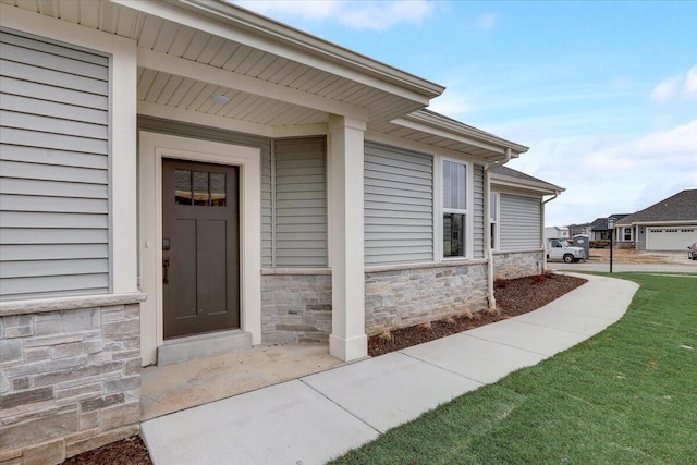 doorway to property featuring a garage