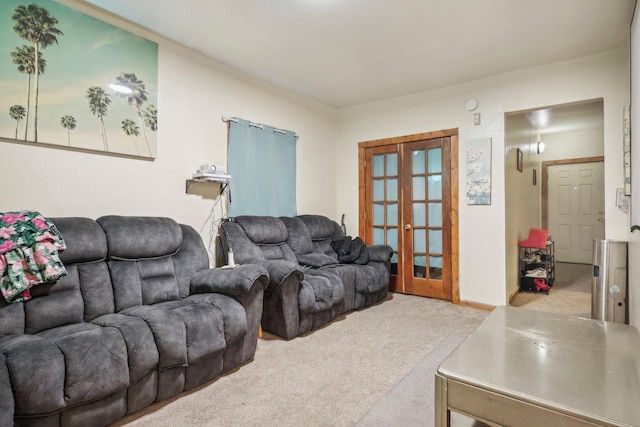 carpeted living room featuring french doors