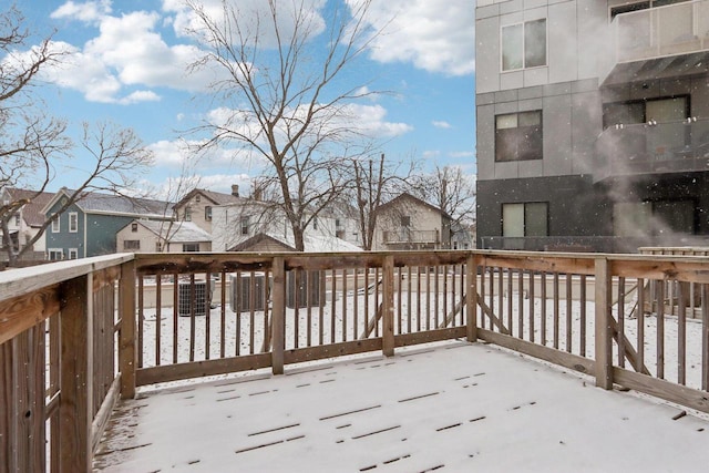 view of snow covered deck