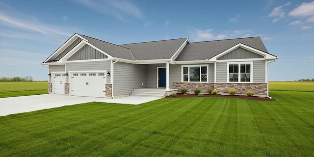 craftsman-style house featuring a garage and a front yard