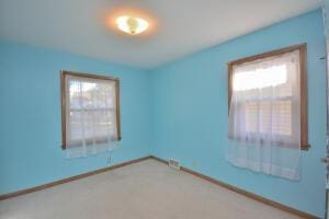 spare room featuring plenty of natural light