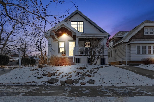 view of front of property featuring covered porch