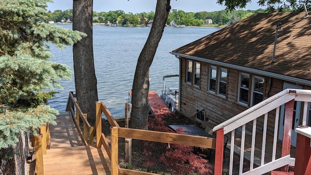 dock area with a water view