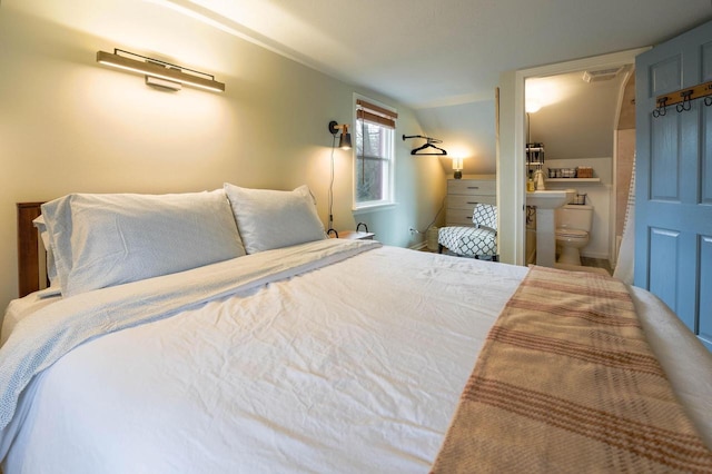 bedroom featuring ensuite bathroom