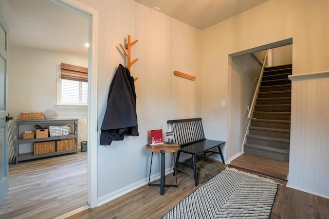 foyer entrance with hardwood / wood-style floors