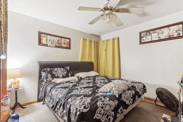 bedroom with ceiling fan and carpet floors