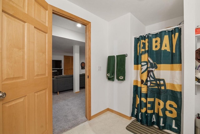 bathroom with a shower with shower curtain