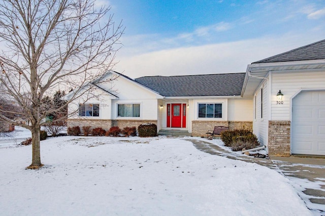 single story home with a garage