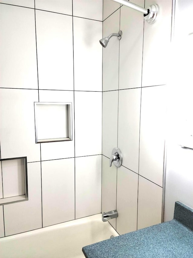 interior space featuring shower / bath combination