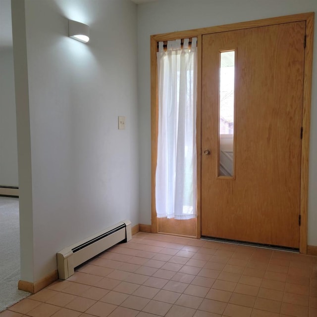 entrance foyer with baseboards and baseboard heating