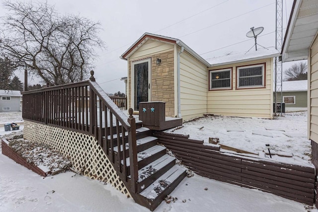 view of snow covered deck