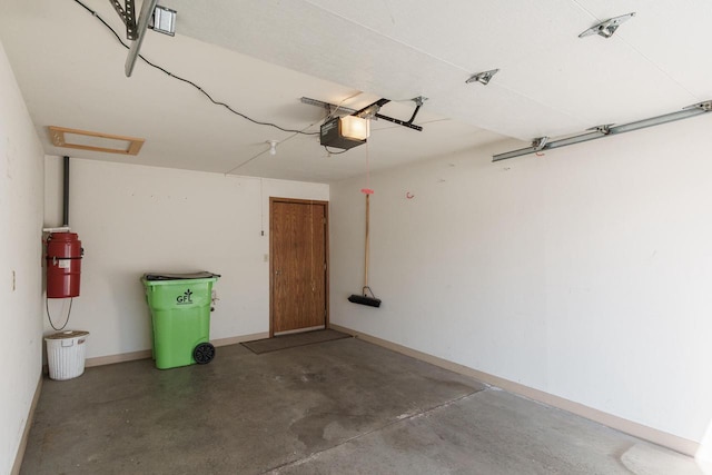 garage featuring a garage door opener