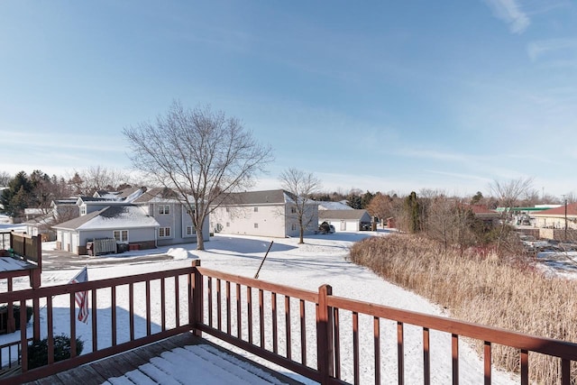 view of snow covered deck