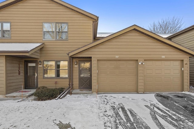 view of front of property with a garage