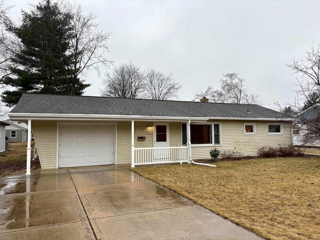 single story home featuring a garage, covered porch, and a front lawn