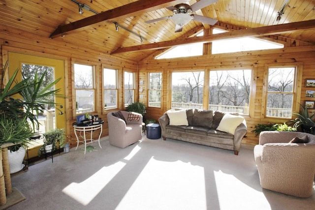 sunroom / solarium featuring vaulted ceiling with beams, track lighting, wooden ceiling, and ceiling fan